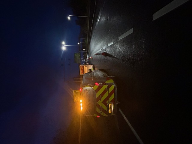 Vehicle being transported on a recovery truck